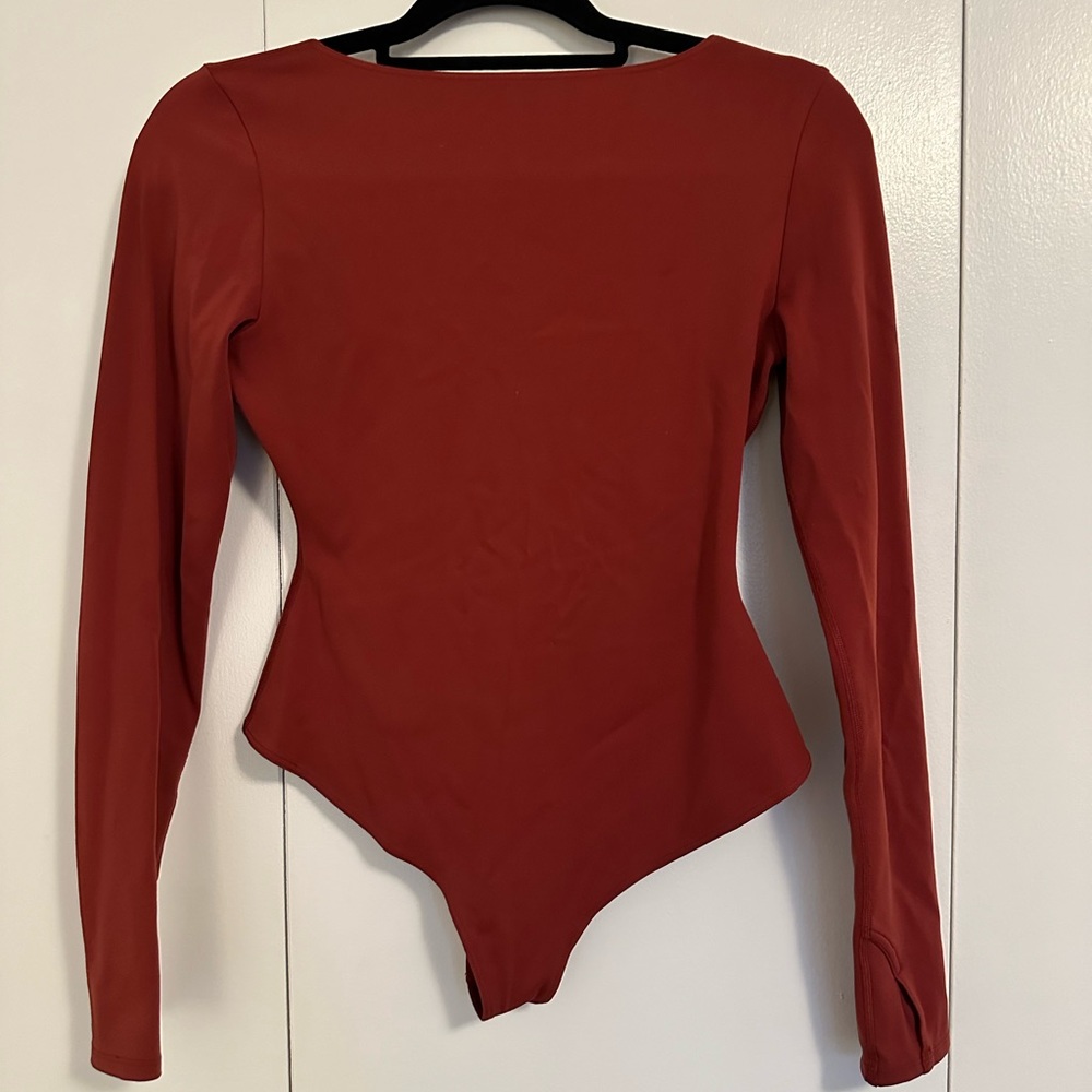 Solid long sleeve body suit